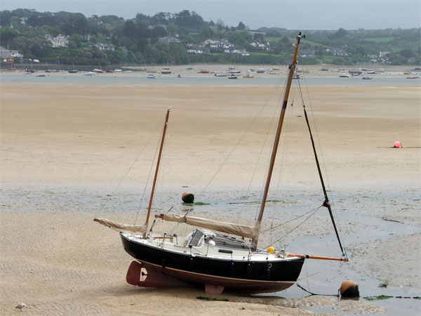 Sailing boat on the Camel Estuary at low tide near Padstow